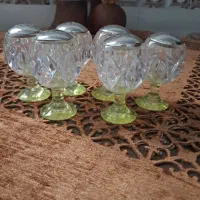 دو دست استکان چای خوری همراه ی دست فنجان