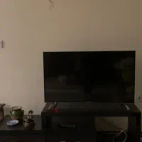 تلویزیون ایکس ویژن ۴۳ اینچ همراه میز تلویزیون