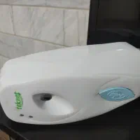 طاووس برنجی زیبا و دستگاه خوشبو کننده هوا