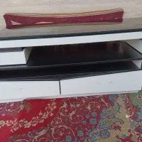 میز تلویزیون همراه دوچرخه و سینما خانواده
