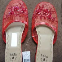 تعدادی لباس وکفش وزانوبند نو