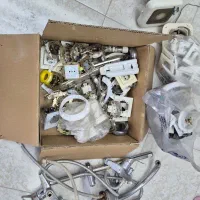 تعدادی کلید و پریز بهمراه شیرآلات