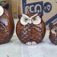 مجسمه های دکوری و بطری شیشه‌ای