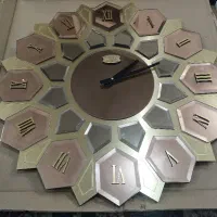 ساعت دیواری طرح آیینه ای