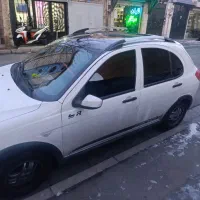 کوییک r مدل 1400 کم‌کار سفید مشکی