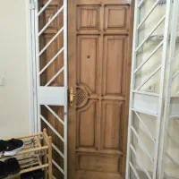 درب ورودی واحد آپارتمانی چوبی با قاب فلزی