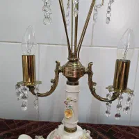 یک عدد شمعدان گلبرجسته انتیک
