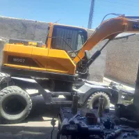 مینی بیل لاستیکی