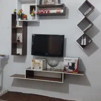 تلویزیونLCDهمراه با دستگاه دیجیتال ودکور دورش