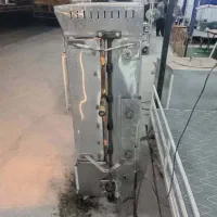 دستگاه پاچینی و مرغ کنتاکی