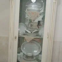 ساعت و گنجه یا ویترین قیمت مناسب