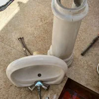 سنگ روشویی همراه با شیرآب
