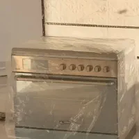 -اجاق گاز آلتون  استیل لمسی دیجیتالی آکبند