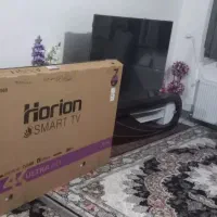 تلویزیون ۶۵ اینچ هوریون با میز و گلس|تلویزیون و پروژکتور|زاهدان, |دیوار