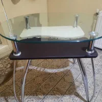 میز ناهار خوری شیشه ای با پایه های استیل