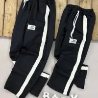 شلوار اسلش بغل نوار کنفی بچگانه