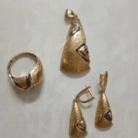 نیم ست طلا 50 تومن بالای تابلو