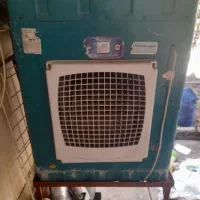 مبل و کولر آبی بزرگ و میزتلویزیون