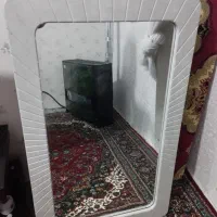 عروسک اینه ساعت ایستاده