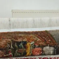 بافنده فرش نیمه کاره