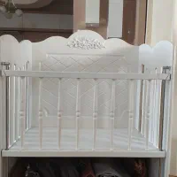 تخت کنار مادر نوزادی