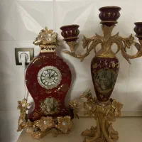 ساعت و  تک شمعدان
