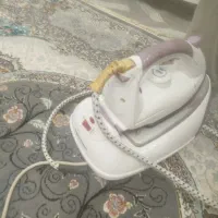 اتو لباس مخزن دار. در حد نو