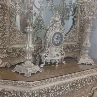 ،اینه کنسول همراه شمعدان و ساعت دکوری و کمد ظروف