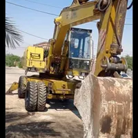 بیل مکانیکی لاستیکیHE100B