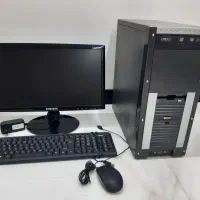 کامپیوتر خانگی به همراه مانیتور و کیبورد و موس