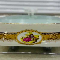 تعدادی ظروف آنتیک دنسی و سورمه ای نو (چک چهارماهه)