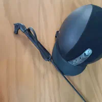 کلاه و شلاق اسب سواری