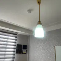یک جفت لوستر طلایی تک شعله