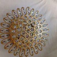 دیوار کوب طلایی