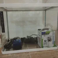 آکواریوم شیشه خم همراه با وسایل