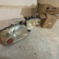 چراغ جلو رونیز اصلی ژاپن فندر گارد جلو اصل و عقب