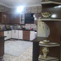 کابینت ام دی اف به همراه سینک ظرفشویی و هود.