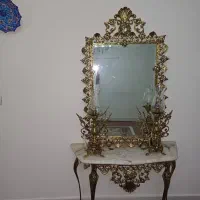 اینه‌ و شمعدان