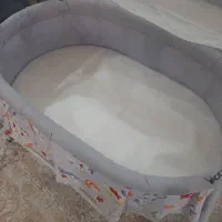 گهواره و آغوشی و لباس