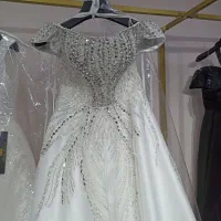 فروش لباس عروس کاملا نو به علت جمع آوری مزون