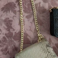 کیف چرم پوستماری برند منط