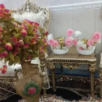 گلدان با گل مصنوعی
