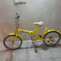 دوچرخه تاشو دنده ای زرد