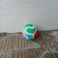 توپ فوتبال چمن