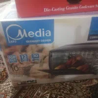 توستر media و قابلمه چدن8پارچه نو