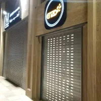 درب برقی کرکره شیشه سکوریت لمینت کرتن وال اسپایدر|خدمات پیشه و مهارت|شیراز, عفیف‌آباد|دیوار