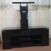 میز تلویزیون شیشه ای همراه با پایه تلویزیون