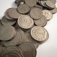 سکه یک ریالی و دو ریالی پهلو.ی