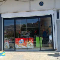 کرکره برقی وشیشه سکوریت