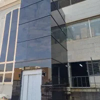 طراحی و اجرای شیشه دور آسانسور